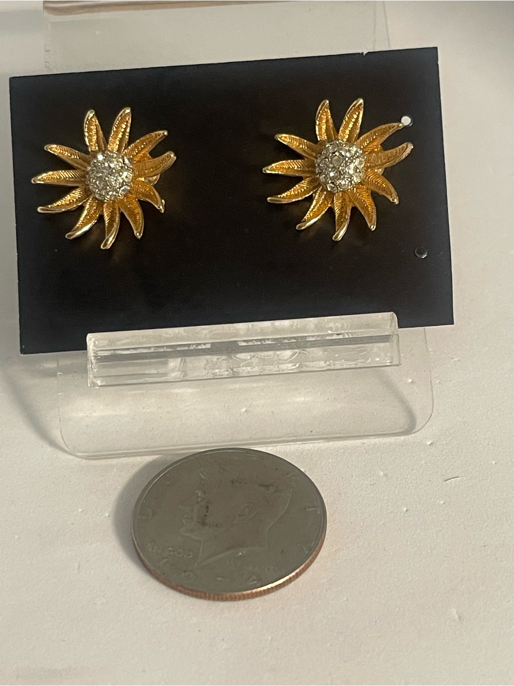 Gold Sunburst With Crystal Center Clip Earrings